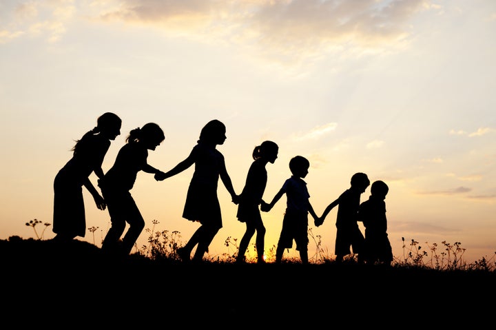 group of happy children playing ...