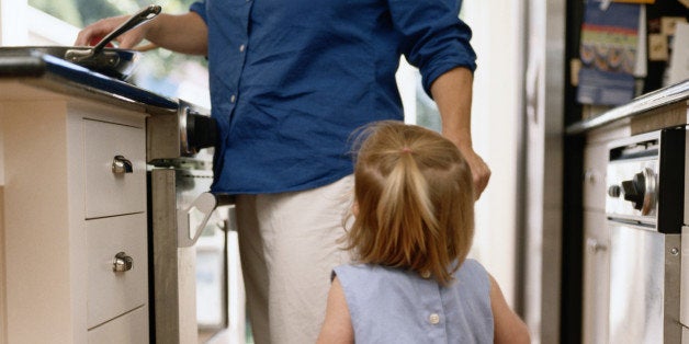 Young Girl and Jack Russell in Kitchen with Woman