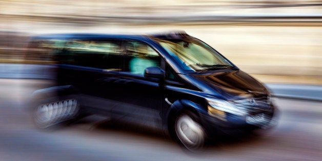 Panned blurred taxi in central London, England, United Kingdom.