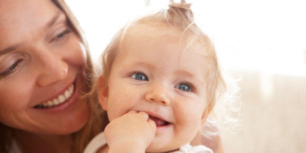 Mother and child smiling