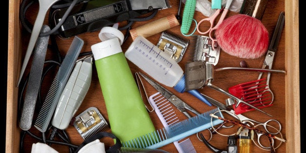 Barber's junk draw with hair related objects.