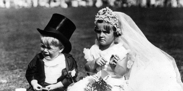 Children in fancy dress costume as bride and groom at Southend.