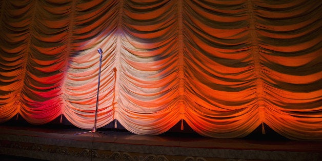 Microphone on empty theater stage