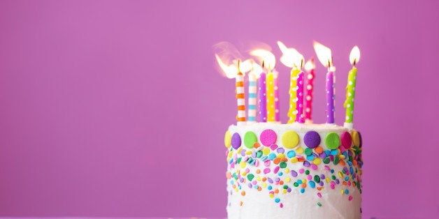 Birthday cake on a pink background