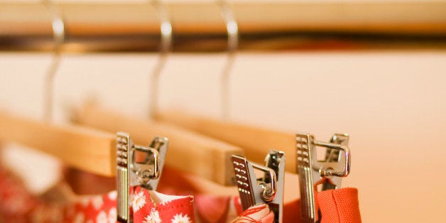 Close-up of skirts hanging on clothes rack