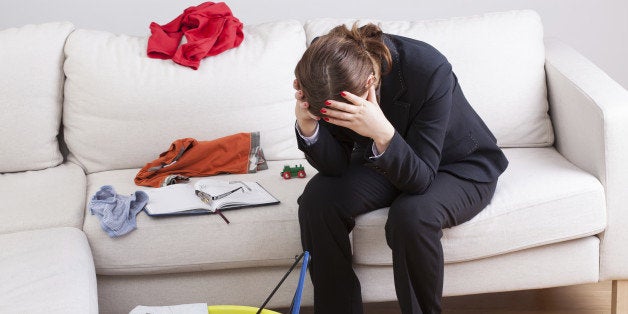 Woman who work and care of house is exhausted and stressed of her workload