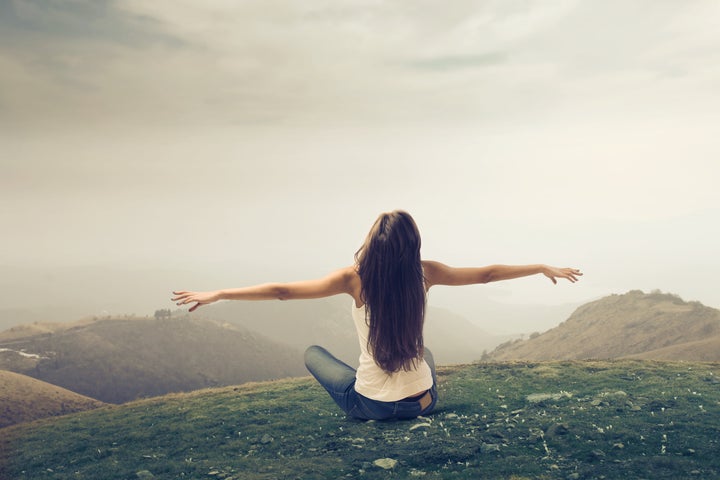 Girl enjoying the freedom in a wasteland