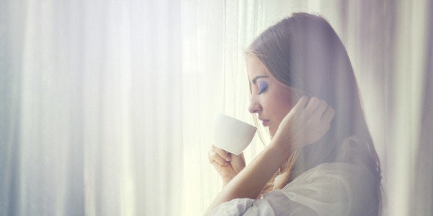 young woman drinking coffee