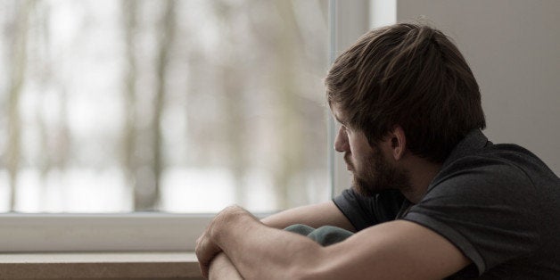 Portrait of young man suffering for depression