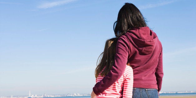 Mother and daughter on a beach