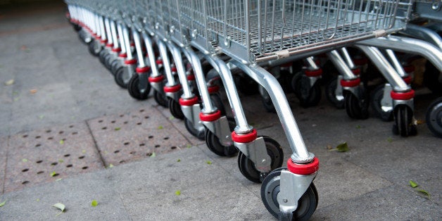 many empty shopping carts in a...