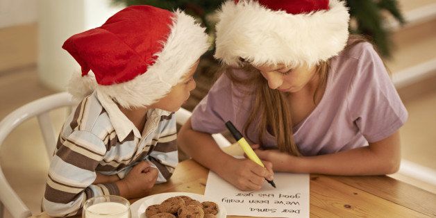 Cropped shot of a young brother and sister writing a letter to Santa