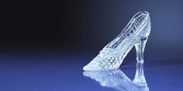 Nice glass slipper on dark blue background with free space for text