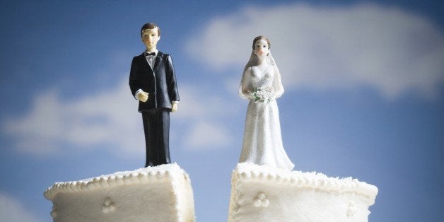 Wedding cake visual metaphor with figurine cake toppers