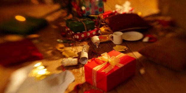 Christmas presents surrounded by mess