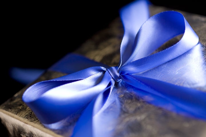 blue ribbon tied in a bow on...