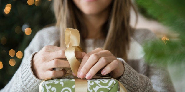 Woman preparing christmas gifts