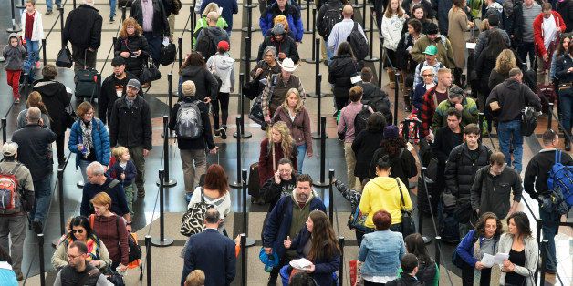 DENVER, CO - NOVEMBER 26: Security lines at Denver International Airport are long but moving fast, November 26, 2014. The airport was busy with thanksgiving travelers. (Photo by RJ Sangosti/The Denver Post via Getty Images)