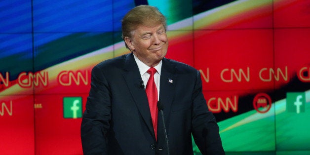 LAS VEGAS, NV - DECEMBER 15: Republican presidential candidate Donald Trump smiles during the CNN Republican presidential debate on December 15, 2015 in Las Vegas, Nevada. This is the last GOP debate of the year, with U.S. Sen. Ted Cruz (R-TX) gaining in the polls in Iowa and other early voting states and Donald Trump rising in national polls. (Photo by Justin Sullivan/Getty Images)