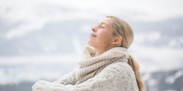 Close-up of a woman sitting with her eyes closed, Crans-Montana, Swiss Alps, Switzerland