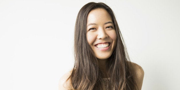 Portrait of woman with long brown hair