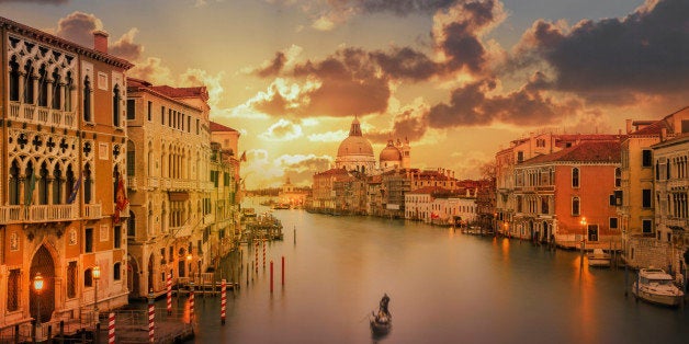 Gondola in the Grand Canal at sunset