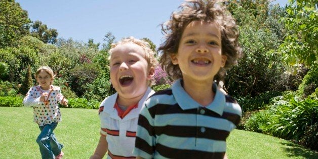Children playing in field