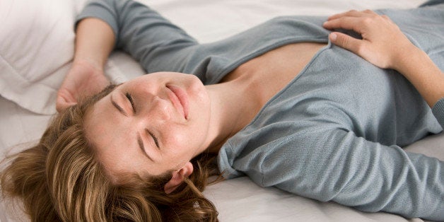 Woman sleeping on the bed