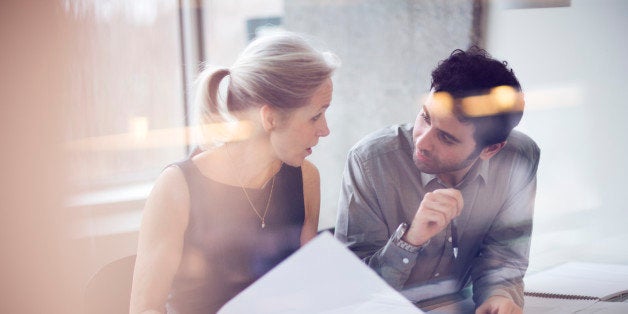 Man and woman in office having a meeting