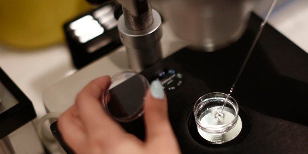 An employee works with a liquid solution in a laboratory for In Vitro Fertilisation (IVF) at the Genesis fertility clinic in Athens, Greece, on Thursday, May 21, 2015. The recession, and loose regulation amid government spending cuts, may have helped the fertility industry. Photographer: Kostas Tsironis/Bloomberg via Getty Images