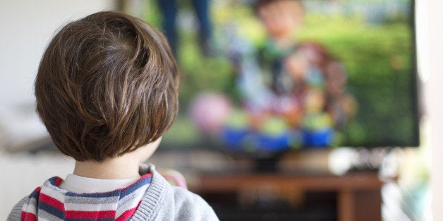 Small kid watching television