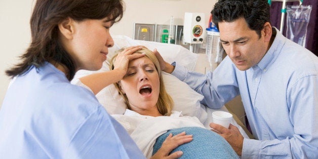 Woman Giving Birth