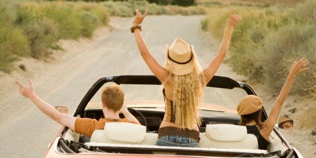 Young friends driving in convertible