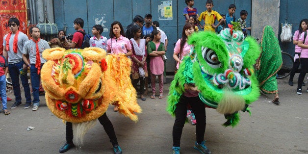 KOLKATA, WEST BENGAL, INDIA - 2016/08/02: Members of Kolkata's Chinese community celebrates New Year in Chinatown. The festivities includes drumming performances, lion dancers, dragon dancers and firecrackers. (Photo by Tanmoy Bhaduri/Pacific Press/LightRocket via Getty Images)