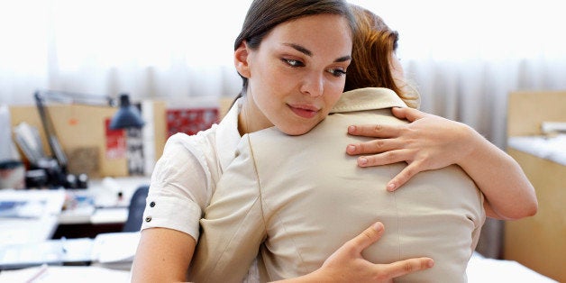 Coworkers Hugging