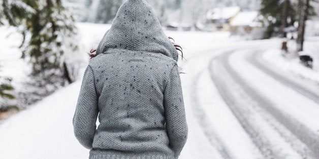 Woman enjoying a winter day on mountains.