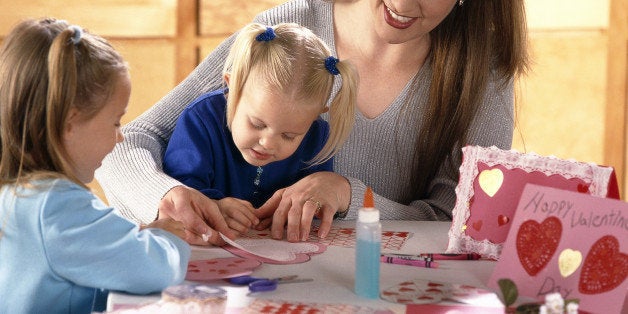 Woman and children coloring