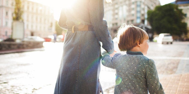 Mother with daughter having a walk