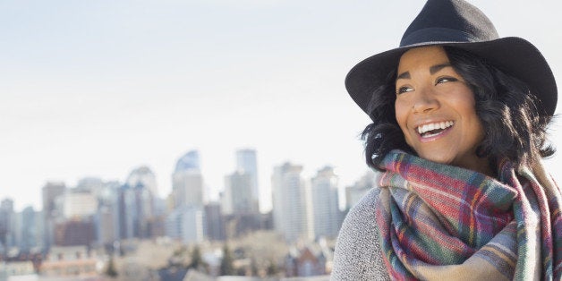 Happy woman looking away outdoors