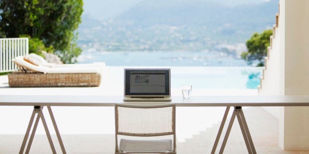 Laptop on desk in living room