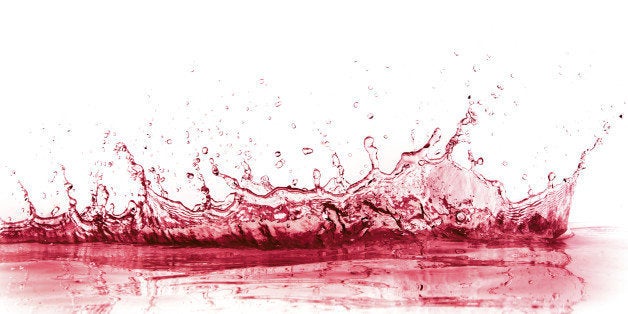 red wine splash isolated on white background