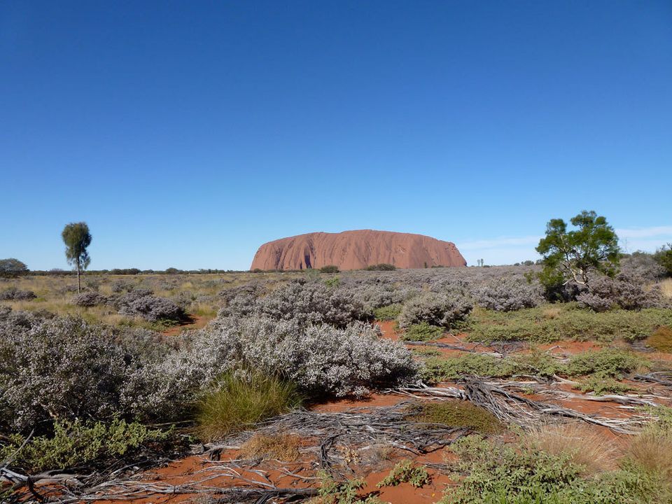 Uluru stands on the horizon