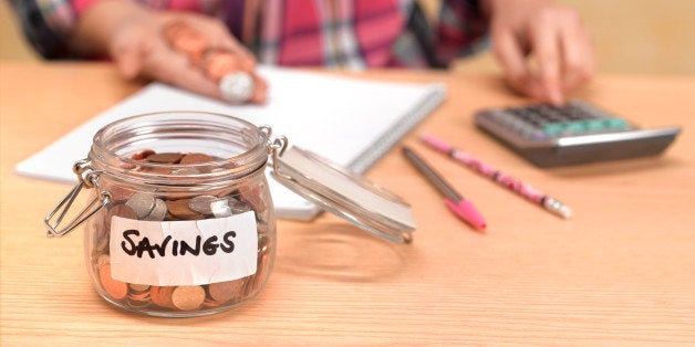 Teenager counting savings