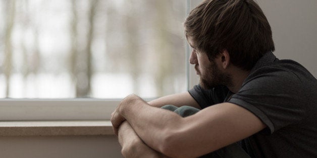 Portrait of young man suffering for depression