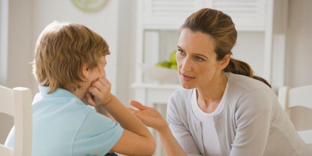 Mother having discussion with son