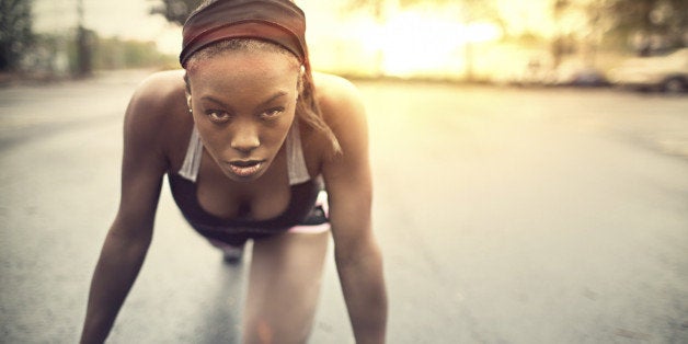 Portrait of a woman starting the jogging.