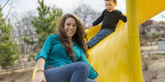 Boy and mom on slide