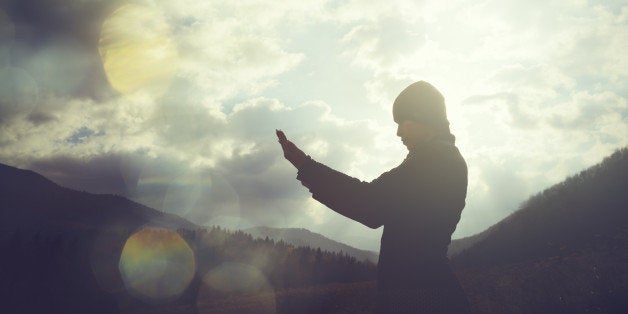 woman praying, tranquil scene, freedom concepts.