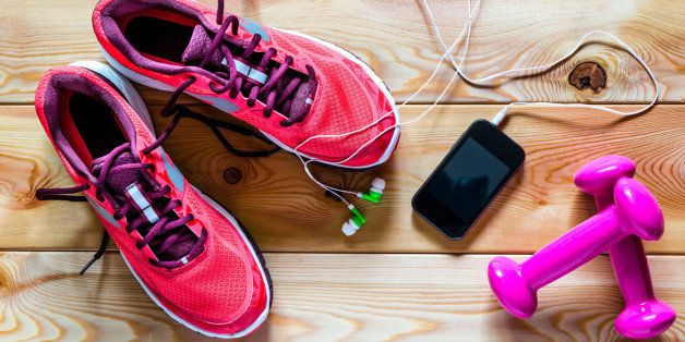 sneakers, dumbbells and other fitness accessories