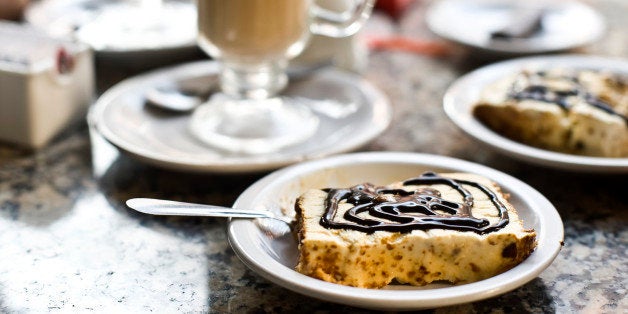 Almendrado - ice cream garnished with toasted almonds and melted chocolate, a traditional dessert in Buenos Aires, Argentina